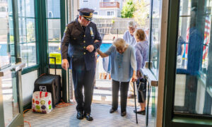 Chief Burton escorting Monmouth County Commissioner Lillian Burry into the new Highlands Borough Hall. Photo's Courtesy of Highlands Business Partnership & Shore Grafx